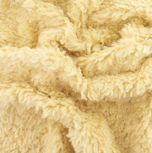 Baby Peipei's Organic Cotton Furry Sherpa. Color is Butter, a creamy pale yellow. Long individual strands create a soft and shaggy Sherpa.