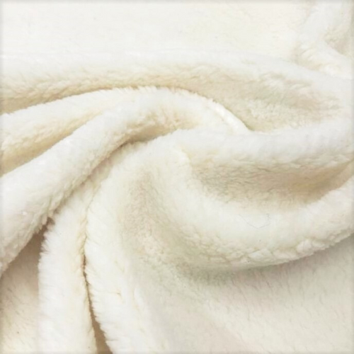 Baby Peipei's Organic Cotton Fluffy Sherpa. A natural cotton white color. Texture is fluffy and sheep-like